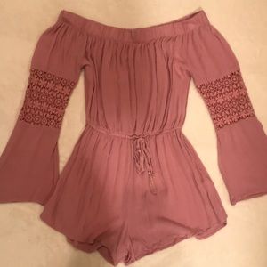 I am selling a pink romper.